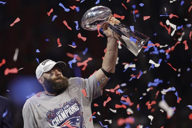New England Patriots' Julian Edelman holds the Vince Lombardi Trophy, after the NFL Super Bowl 53 football game against the Los Angeles Rams, Sunday, Feb. 3, 2019, in Atlanta. The Patriots won 13-3. Edelman was named the Most Valuable Player. (AP Photo/Jeff Roberson)