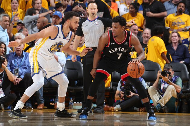 OAKLAND, CA - JUNE 5: Kyle Lowry #7 of the Toronto Raptors handles the ball against Stephen Curry #30 of the Golden State Warriors during Game Three of the NBA Finals on June 5, 2019 at ORACLE Arena in Oakland, California. NOTE TO USER: User expressly acknowledges and agrees that, by downloading and/or using this photograph, user is consenting to the terms and conditions of Getty Images License Agreement. Mandatory Copyright Notice: Copyright 2019 NBAE (Photo by Nathaniel S. Butler/NBAE via Getty Images)