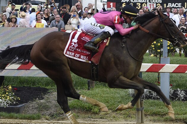War of Will, ridden by Tyler Gaffalione, crosses the finish line first to win the Preakness Stakes horse race at Pimlico Race Course, Saturday, May 18, 2019, in Baltimore. (AP Photo/Mike Stewart)