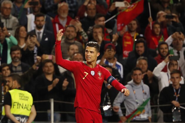 Portugal's Cristiano Ronaldo celebrates after scoring his side's second goal during the UEFA Nations League semifinal soccer match between Portugal and Switzerland at the Dragao stadium in Porto, Portugal, Wednesday, June 5, 2019. (AP Photo/Armando Franca)