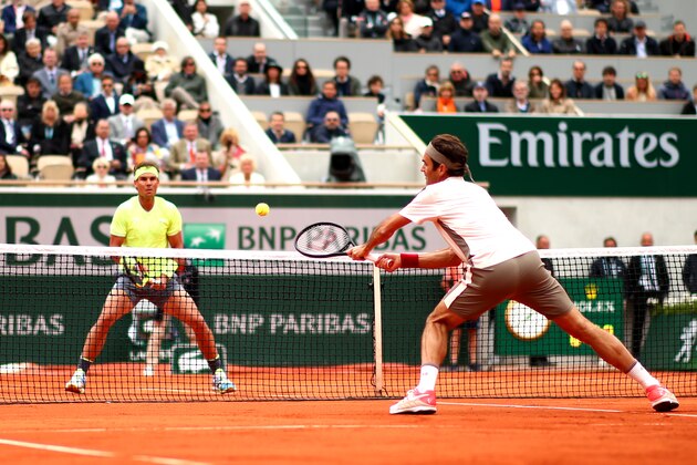 PARIS, FRANCE - JUNE 07: Roger Federer of Switzerland plays a backhand during his mens singles semi-final match against Rafael Nadal of Spain during Day thirteen of the 2019 French Open at Roland Garros on June 07, 2019 in Paris, France. (Photo by Clive Brunskill/Getty Images)