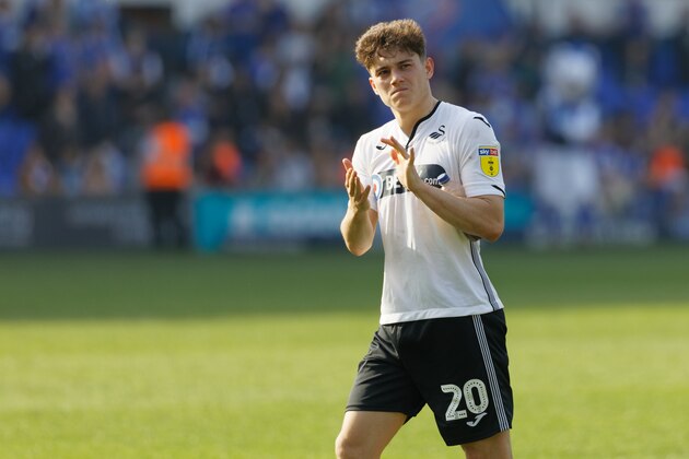 IPSWICH, ENGLAND - APRIL 22: Daniel James of Swansea City thanks away supporters after the final whistle during the Sky Bet Championship match between Ipswich Town an Swansea City at Portman Road Stadium on April 22, 2019 in Ipswich, England. (Photo by Athena Pictures/Getty Images)