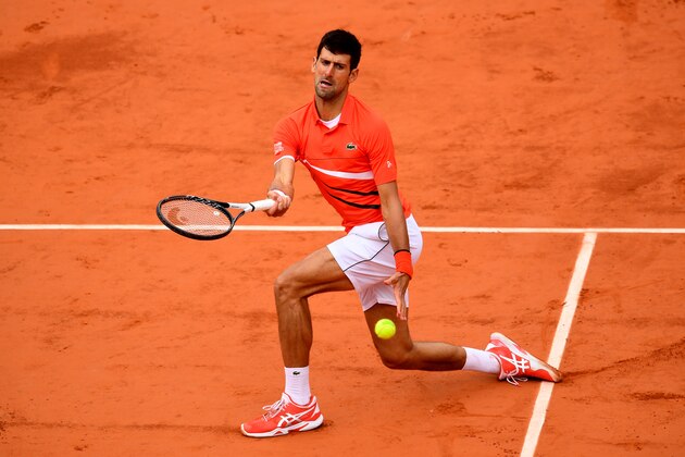 PARIS, FRANCE - JUNE 07: Novak Djokovic of Serbia plays a forehand during his mens singles semi-final match against Dominic Thiem of Austria during Day thirteen of the 2019 French Open at Roland Garros on June 07, 2019 in Paris, France. (Photo by Clive Mason/Getty Images)