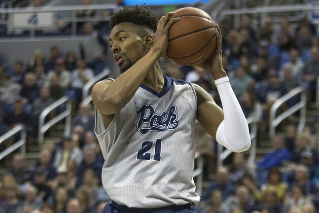 Nevada forward Jordan Brown (21) against Little Rock in the first half of an NCAA college basketball game in Reno, Nev., Friday, Nov. 16, 2018. (AP Photo/Tom R. Smedes)
