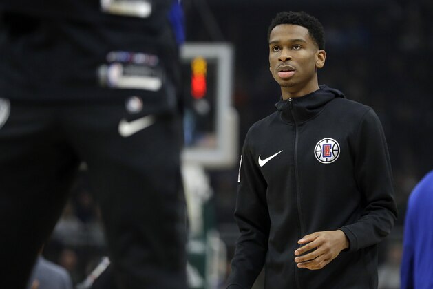 LA Clippers' Shai Gilgeous-Alexander warms up before an NBA basketball game against the Milwaukee Bucks Thursday, March 28, 2019, in Milwaukee. (AP Photo/Aaron Gash)