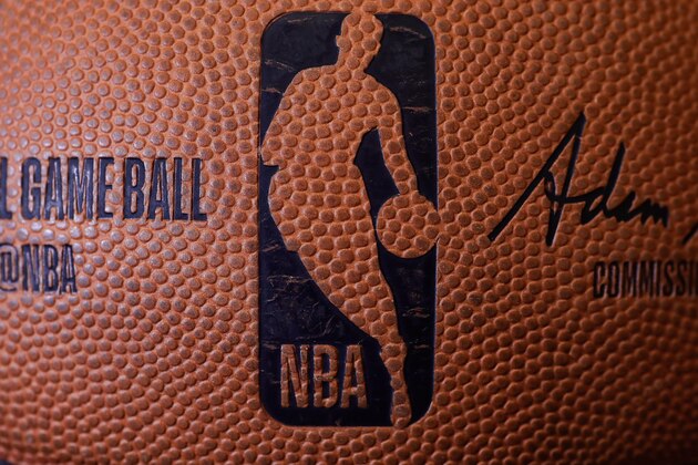 TORONTO, ON - OCTOBER 26: A detailed view of the dimpled NBA logo on a basketball patterned after a silhouette of former player Jerry West before the start of the Toronto Raptors NBA game against the Dallas Mavericks at Scotiabank Arena on October 26, 2018 in Toronto, Canada. NOTE TO USER: User expressly acknowledges and agrees that, by downloading and or using this photograph, User is consenting to the terms and conditions of the Getty Images License Agreement. (Photo by Tom Szczerbowski/Getty Images)