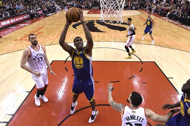 TORONTO, ONTARIO - MAY 30:  Kevon Looney #5 of the Golden State Warriors dunks the ball against the Toronto Raptors in the second half during Game One of the 2019 NBA Finals at Scotiabank Arena on May 30, 2019 in Toronto, Canada. NOTE TO USER: User expressly acknowledges and agrees that, by downloading and or using this photograph, User is consenting to the terms and conditions of the Getty Images License Agreement. (Photo by Kyle Terada - Pool/Getty Images)