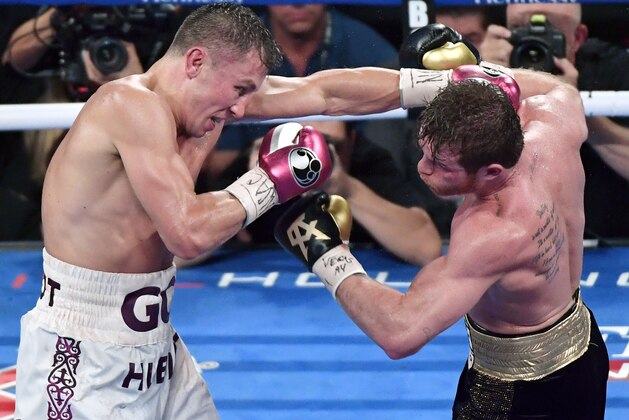 LAS VEGAS, NV - SEPTEMBER 15:  Gennady Golovkin (L) and Canelo Alvarez battle in the ninth round of their WBC/WBA middleweight title fight at T-Mobile Arena on September 15, 2018 in Las Vegas, Nevada. Alvarez won by majority decision.  (Photo by Ethan Miller/Getty Images)