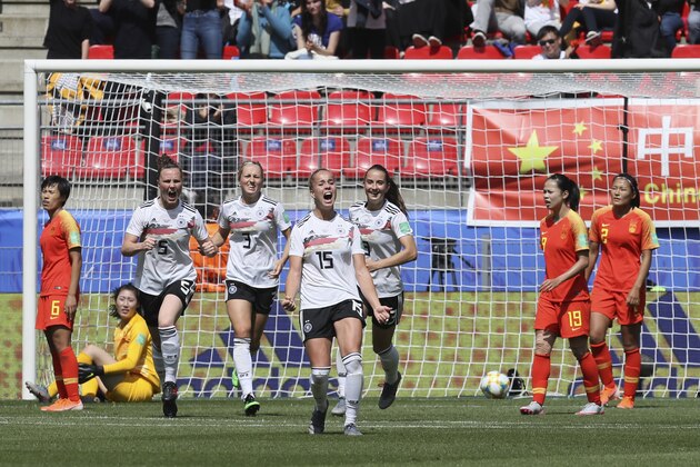 Germany's Giulia Gwinn, center, celebrates after scoring her side's first goal during the Women's World Cup Group B soccer match between Germany and China, at the Roazhon Park stadium, in Rennes, France, Saturday, June 8, 2019. (AP Photo/David Vincent)