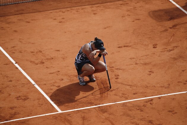Australia's Ashleigh Barty celebrates winning her women's final match of the French Open tennis tournament against Marketa Vondrousova of the Czech Republic in two sets 6-1, 6-3, at the Roland Garros stadium in Paris, Saturday, June 8, 2019. (AP Photo/Christophe Ena)