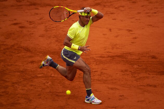 PARIS, FRANCE - JUNE 07:  Rafael Nadal of Spain hits a forehand against Roger Federer of Switzerland in the semi finals of the men's singles during Day 13 of the 2019 French Open at Roland Garros on June 07, 2019 in Paris, France. (Photo by TPN/Getty Images)