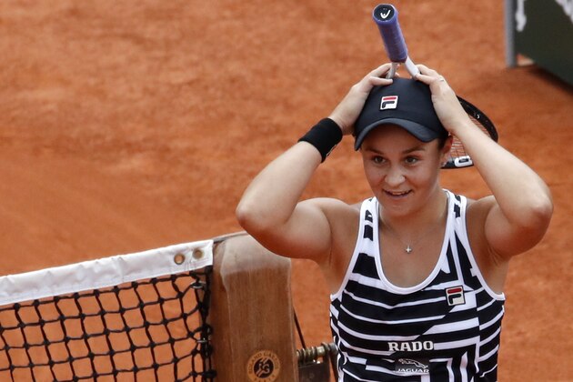 Australia's Ashleigh Barty celebrates winning her women's final match of the French Open tennis tournament against Marketa Vondrousova of the Czech Republic in two sets 6-1, 6-3, at the Roland Garros stadium in Paris, Saturday, June 8, 2019. (AP Photo/Christophe Ena)