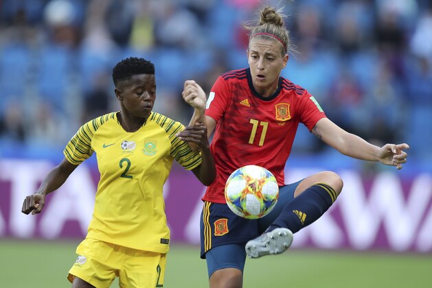 Spain's Alexia Putellas, right, vies for the ball against South Africa's Lebohang Ramalepe during the Women's World Cup Group B soccer match between Spain and South Africa at the Stade Oceane in Le Havre, France, Saturday, June 8, 2019. (AP Photo/Francisco Seco)