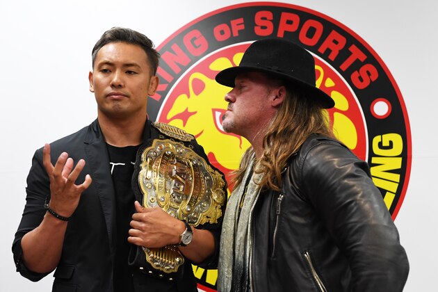 TOKYO, JAPAN - JUNE 08: IWGP Heavy Weight Champion Kazuchika Okada and the challenger Chris Jericho pose for photographers during the Dominion 6.9 In Osaka-Jo Hall press conference of NJPW on June 08, 2019 in Tokyo, Japan. (Photo by Etsuo Hara/Getty Images)