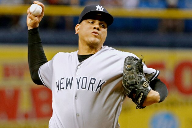 TAMPA, FL  SEPTEMBER 24: Dellin Betances #68 of the New York Yankees delivers a pitch in the eighth inning of the game against the Tampa Bay Rays at Tropicana Field on September 24, 2018 in St. Petersburg, Florida. (Photo by Joseph Garnett Jr./Getty Images)