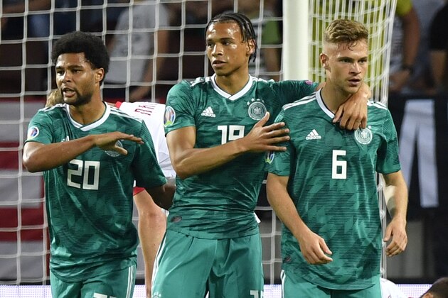Germany's midfielder Leroy Sane (C) celebrates with teammates after scoring the opening goal during the Euro 2020 football qualification match between Belarus and Germany in Borisov outside Minsk on June 8, 2019. (Photo by John MACDOUGALL / AFP)        (Photo credit should read JOHN MACDOUGALL/AFP/Getty Images)