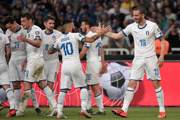 Italy's defender Leonardo Bonucci (R) celebrates with teammates after scoring a goal during the Euro 2020 football qualification match between Greece and Italy at the Olympic Stadium in Athens on June 8, 2019. (Photo by LOUISA GOULIAMAKI / AFP)        (Photo credit should read LOUISA GOULIAMAKI/AFP/Getty Images)
