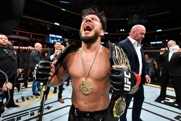 CHICAGO, IL - JUNE 08:  Henry Cejudo celebrates his TKO victory over Marlon Moraes of Brazil in their bantamweight championship bout during the UFC 238 event at the United Center on June 8, 2019 in Chicago, Illinois. (Photo by Jeff Bottari/Zuffa LLC/Zuffa LLC via Getty Images)
