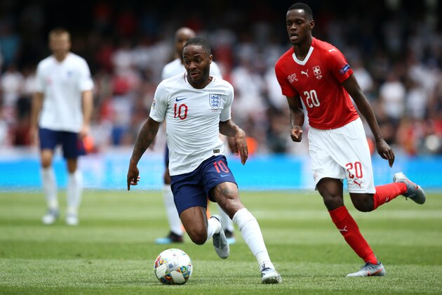 GUIMARAES, PORTUGAL - JUNE 09: Raheem Sterling of England battles for possession with Edimilson Fernandes of Switzerland during the UEFA Nations League Third Place Playoff match between Switzerland and England at Estadio D. Afonso Henriques on June 09, 2019 in Guimaraes, Portugal. (Photo by Jan Kruger/Getty Images)