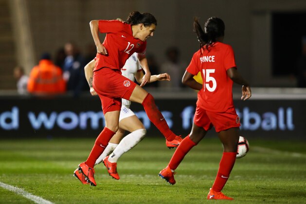 MANCHESTER, ENGLAND - APRIL 05:  Christine Sinclair of Canada scores her team's first goal during the International Friendly between England Women and Canada Women at The Academy Stadium on April 05, 2019 in Manchester, England. (Photo by Clive Brunskill/Getty Images)