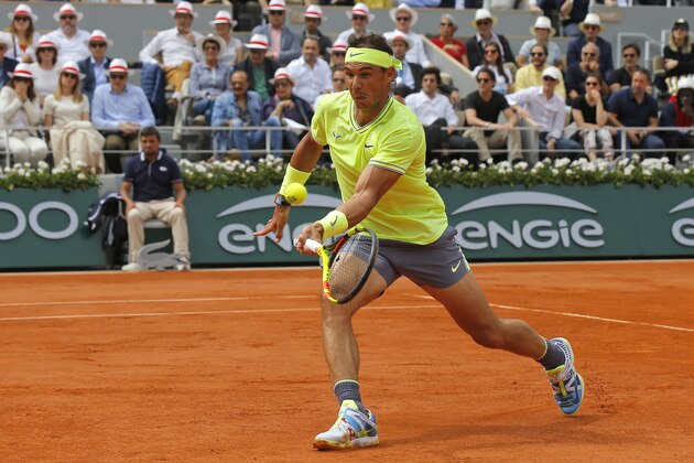 Spain's Rafael Nadal plays a shot against Austria's Dominic Thiem during the men's final match of the French Open tennis tournament at the Roland Garros stadium in Paris, Sunday, June 9, 2019. (AP Photo/Michel Euler)