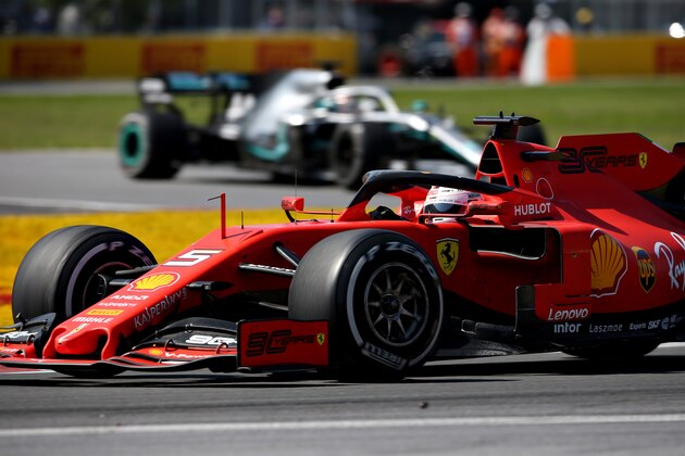MONTREAL, QUEBEC - JUNE 09: Sebastian Vettel of Germany driving the (5) Scuderia Ferrari SF90 leads Lewis Hamilton of Great Britain driving the (44) Mercedes AMG Petronas F1 Team Mercedes W10 on track during the F1 Grand Prix of Canada at Circuit Gilles Villeneuve on June 09, 2019 in Montreal, Canada. (Photo by Charles Coates/Getty Images)