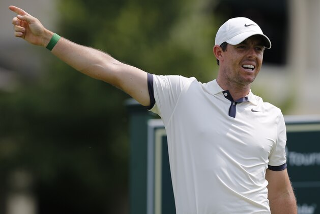 Rory McIlroy, of Northern Ireland, reacts to his tee shot on the 10th hole during the second round of the Memorial golf tournament Friday, May 31, 2019, in Dublin, Ohio. (AP Photo/Jay LaPrete)