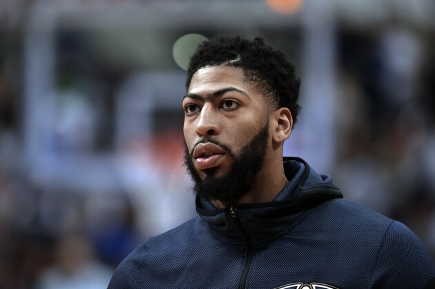 New Orleans Pelicans forward Anthony Davis (23) participates in warm ups before an NBA basketball game against the Dallas Mavericks in Dallas, Monday, March 18, 2019. (AP Photo/Tony Gutierrez)