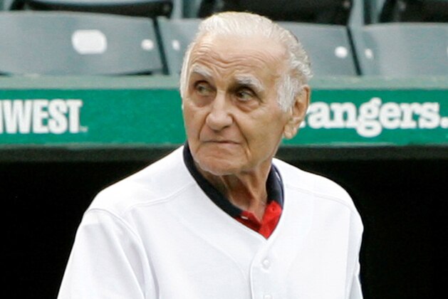 FILE - In this Aug. 16, 2008, file photo, former Texas Rangers manager Frank Lucchesi walks onto the field during the team's Hall of Fame induction ceremony prior to a Major League Baseball game against the Tampa Bay Rays in Arlington, Texas. Lucchesi, who replaced the fired Billy Martin as manager of the Rangers in 1975 has died. He was 92. The Rangers said Lucchesi died Saturday, June 8, 2019.  (AP Photo/Tony Gutierrez, File)