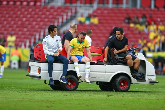 PORTO ALEGRE, BRAZIL - JUNE 9: Arthur of Brazil leaves the field after being injured during the match Brazil v Honduras, at Beira-Rio Stadium on June 9, 2019, in Porto Alegre, Brazil. (Photo by Lucas Uebel/Getty Images)