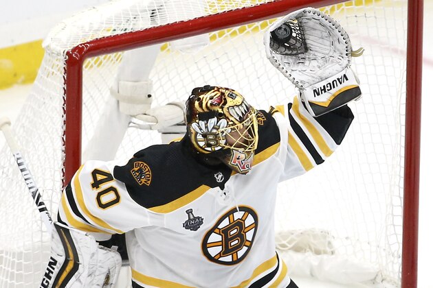 Boston Bruins goaltender Tuukka Rask, of Finland, gloves a shot against the St. Louis Blues during the second period of Game 6 of the NHL hockey Stanley Cup Final Sunday, June 9, 2019, in St. Louis. (AP Photo/Scott Kane)