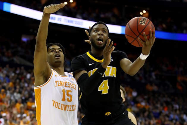 COLUMBUS, OHIO - MARCH 24:  Isaiah Moss #4 of the Iowa Hawkeyes goes up for a shot against Derrick Walker #15 of the Tennessee Volunteers during their game in the Second Round of the NCAA Basketball Tournament at Nationwide Arena on March 24, 2019 in Columbus, Ohio. (Photo by Gregory Shamus/Getty Images)