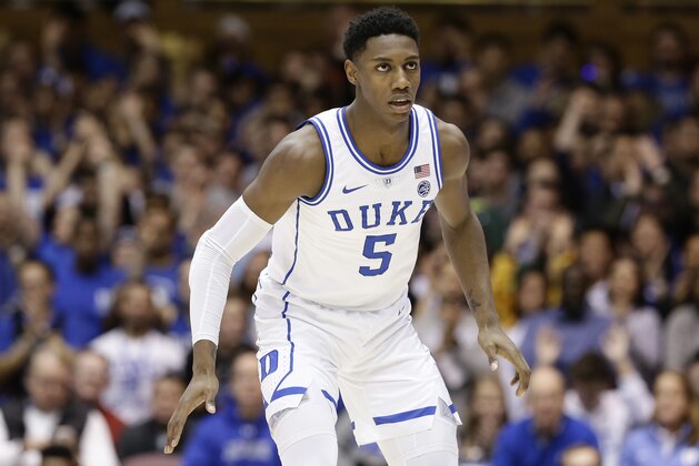 Duke's RJ Barrett (5) guards his opponent during the second half of an NCAA college basketball game against Syracuse in Durham, N.C., Monday, Jan. 14, 2019. Syracuse won 95-91. (AP Photo/Gerry Broome)