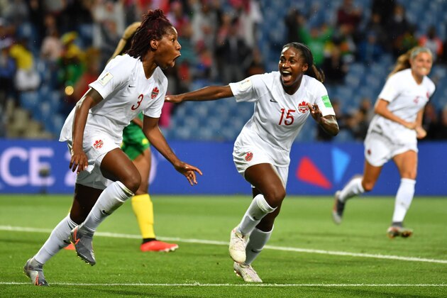 Canada's defender Kadeisha Buchanan (L) celebrates after scoring a goal during the France 2019 Women's World Cup Group E football match between Canada and Cameroon, on June 10, 2019, at the Mosson Stadium in Montpellier, southern France. (Photo by Pascal GUYOT / AFP)        (Photo credit should read PASCAL GUYOT/AFP/Getty Images)