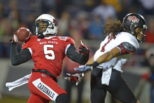 Ball State cornerback Eric Patterson (5) breaks up a pass intended for Arkansas State wide receiver Julian Jones (7) in the first quarter of the GoDaddy Bowl NCAA college football game, Sunday, Jan. 5, 2014, in Mobile, Ala. (AP Photo/G.M. Andrews)