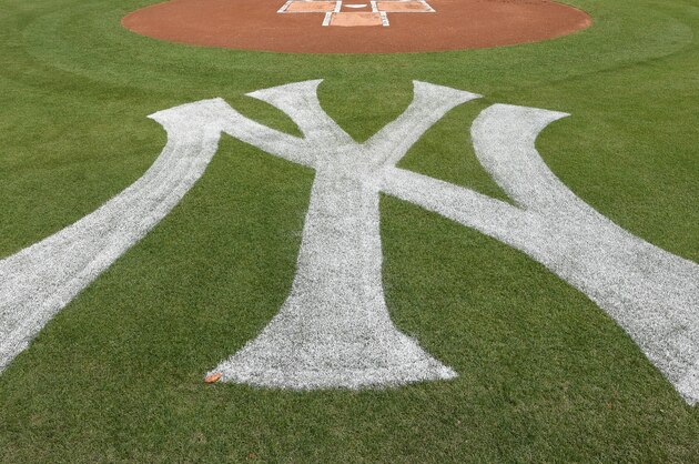TAMPA, FL - FEBRUARY 23:  A general view of George M. Steinbrenner Field as players and coaches from the Detroit Tigers and the New York Yankees line-up during the National Anthem prior to the Spring Training game at George M. Steinbrenner Field on February 23, 2018 in Tampa, Florida. The Yankees defeated the Tigers 3-1.  (Photo by Mark Cunningham/MLB Photos via Getty Images)