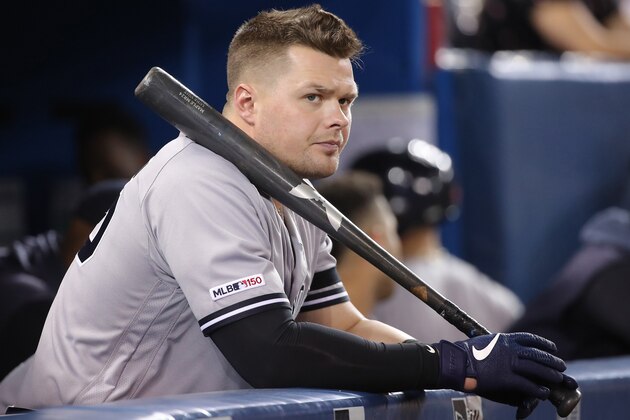 TORONTO, ON - JUNE 06: Luke Voit #45 of the New York Yankees holds a bat as he looks on from the dugout while preparing for his next at bat during MLB game action against the Toronto Blue Jays at Rogers Centre on June 6, 2019 in Toronto, Canada. (Photo by Tom Szczerbowski/Getty Images)
