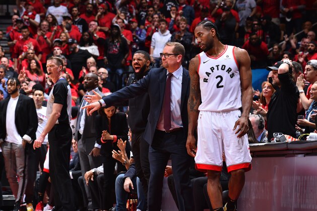 TORONTO, CANADA - JUNE 2: Head Coach Nick Nurse and Kawhi Leonard #2 of the Toronto Raptors looks on against the Golden State Warriors  during Game Two of the NBA Finals on June 2, 2019 at Scotiabank Arena in Toronto, Ontario, Canada. NOTE TO USER: User expressly acknowledges and agrees that, by downloading and/or using this photograph, user is consenting to the terms and conditions of the Getty Images License Agreement. Mandatory Copyright Notice: Copyright 2019 NBAE (Photo by Jesse D. Garrabrant/NBAE via Getty Images)