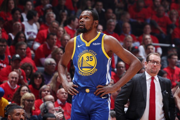 TORONTO, CANADA - JUNE 10: Kevin Durant #35 of the Golden State Warriors looks on against the Toronto Raptors  during Game Five  of the NBA Finals on June 10, 2019 at Scotiabank Arena in Toronto, Ontario, Canada. NOTE TO USER: User expressly acknowledges and agrees that, by downloading and/or using this photograph, user is consenting to the terms and conditions of the Getty Images License Agreement. Mandatory Copyright Notice: Copyright 2019 NBAE (Photo by Nathaniel S. Butler/NBAE via Getty Images)