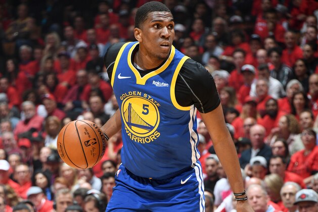 TORONTO, CANADA - JUNE 10: Kevon Looney #5 of the Golden State Warriors handles the ball against the Toronto Raptors during Game Five of the NBA Finals on June 10, 2019 at Scotiabank Arena in Toronto, Ontario, Canada. NOTE TO USER: User expressly acknowledges and agrees that, by downloading and/or using this photograph, user is consenting to the terms and conditions of the Getty Images License Agreement. Mandatory Copyright Notice: Copyright 2019 NBAE (Photo by Andrew D. Bernstein/NBAE via Getty Images) TORONTO, CANADA - JUNE 10: Kevon Looney #5 of the Golden State Warriors handles the ball against the Toronto Raptors during Game Five of the NBA Finals on June 10, 2019 at Scotiabank Arena in Toronto, Ontario, Canada. NOTE TO USER: User expressly acknowledges and agrees that, by downloading and/or using this photograph, user is consenting to the terms and conditions of the Getty Images License Agreement. Mandatory Copyright Notice: Copyright 2019 NBAE (Photo by Andrew D. Bernstein/NBAE via Getty Images)