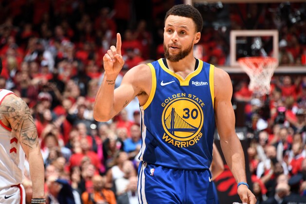TORONTO, CANADA - JUNE 10: Stephen Curry #30 of the Golden State Warriors reacts to a play during Game Five of the NBA Finals against the Toronto Raptors on June 10, 2019 at Scotiabank Arena in Toronto, Ontario, Canada. NOTE TO USER: User expressly acknowledges and agrees that, by downloading and/or using this photograph, user is consenting to the terms and conditions of the Getty Images License Agreement. Mandatory Copyright Notice: Copyright 2019 NBAE (Photo by Andrew D. Bernstein/NBAE via Getty Images)