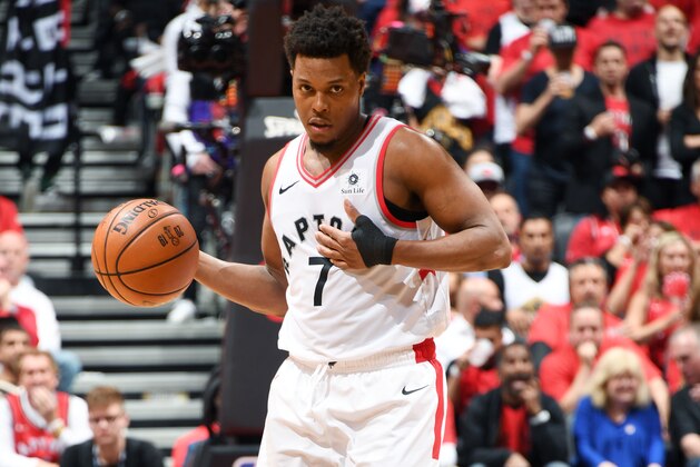TORONTO, CANADA - JUNE 10: Kyle Lowry #7 of the Toronto Raptors handles the ball against the Golden State Warriors during Game Five of the NBA Finals on June 10, 2019 at Scotiabank Arena in Toronto, Ontario, Canada. NOTE TO USER: User expressly acknowledges and agrees that, by downloading and/or using this photograph, user is consenting to the terms and conditions of the Getty Images License Agreement. Mandatory Copyright Notice: Copyright 2019 NBAE (Photo by Andrew D. Bernstein/NBAE via Getty Images)