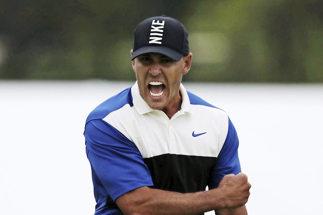 Brooks Koepka reacts after sinking a putt on the 18th green to win the PGA Championship golf tournament, Sunday, May 19, 2019, at Bethpage Black in Farmingdale, N.Y. (AP Photo/Charles Krupa)