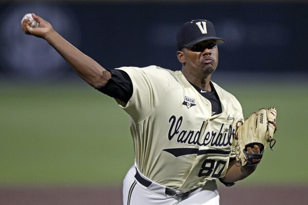 Vanderbilt's Kumar Rocker throws to a Duke batter in the first inning of an NCAA college baseball tournament super regional game Saturday, June 8, 2019, in Nashville, Tenn. (AP Photo/Wade Payne)