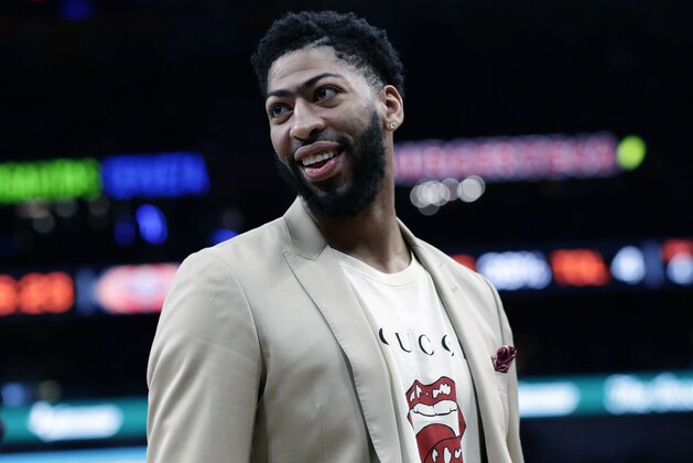 FILE - In this Feb. 2, 2019, file photo, New Orleans Pelicans forward Anthony Davis (23) smiles during the second half of an NBA basketball game against the San Antonio Spurs, in San Antonio. Only a few hours remain to determine if the Anthony Davis saga ends for this season or lingers into the summer. The NBA trade deadline is Thursday, Feb. 7, 2019, at 3 p.m. EST, and Davis is still seeking a trade from the New Orleans Pelicans.(AP Photo/Eric Gay, File)