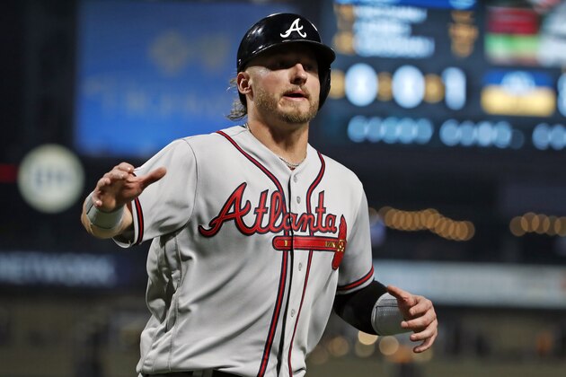 Atlanta Braves' Josh Donaldson scores on a single by Austin Riley off Pittsburgh Pirates starting pitcher Joe Musgrove during the second inning of a baseball game in Pittsburgh, Wednesday, June 5, 2019. (AP Photo/Gene J. Puskar)