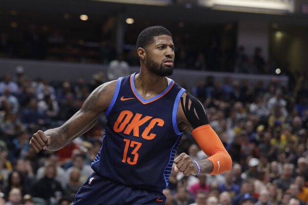 Oklahoma City Thunder's Paul George reacts after a dunk during the first half of an NBA basketball game against the Indiana Pacers, Thursday, March 14, 2019, in Indianapolis. (AP Photo/Darron Cummings)