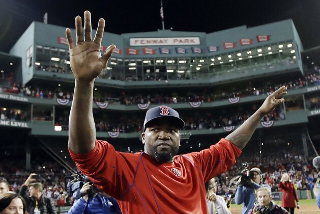 FILE - In this Oct. 10, 2016, file photo, Boston Red Sox's David Ortiz waves from the field at Fenway Park after Game 3 of baseball's American League Division Series against the Cleveland Indians in Boston. Ortiz returned to Boston for medical care after being shot in a bar Sunday, June 9, 2019, in his native Dominican Republic. (AP Photo/Charles Krupa, File)