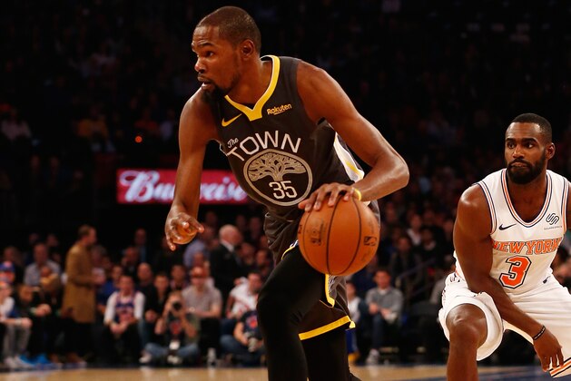 NEW YORK, NY - OCTOBER 26:  Kevin Durant #35 of the Golden State Warriors in action against the New York Knicks at Madison Square Garden on October 26, 2018 in New York City. NOTE TO USER: User expressly acknowledges and agrees that, by downloading and or using this photograph, User is consenting to the terms and conditions of the Getty Images License Agreement. Golden State Warriors defeated the New York Knicks 128-100.  (Photo by Mike Stobe/Getty Images)