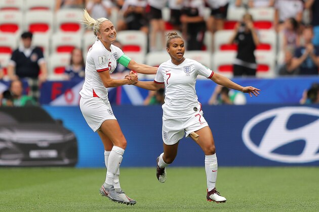NICE, FRANCE - JUNE 09: Nikita Parris of England celebrates with teammate Steph Houghton after scoring her team's first goal during the 2019 FIFA Women's World Cup France group D match between England and Scotland at Stade de Nice on June 09, 2019 in Nice, France. (Photo by Richard Heathcote/Getty Images)